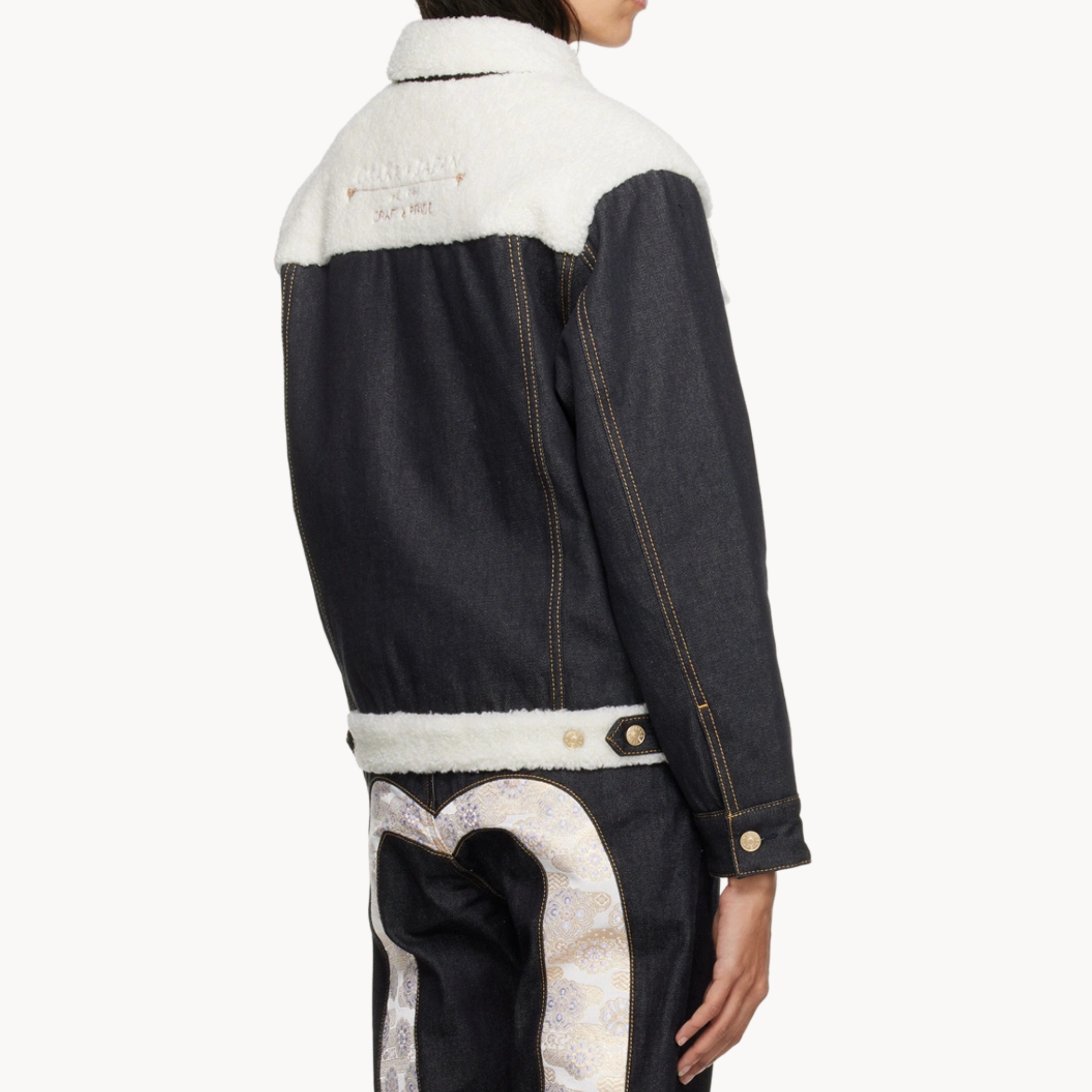 Celebrity-style Evisu sherpa denim jacket worn by Michael Bivins in 2025