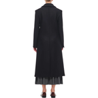 Celebrity-inspired Allison Janney black wool coat outfit from The Diplomat
