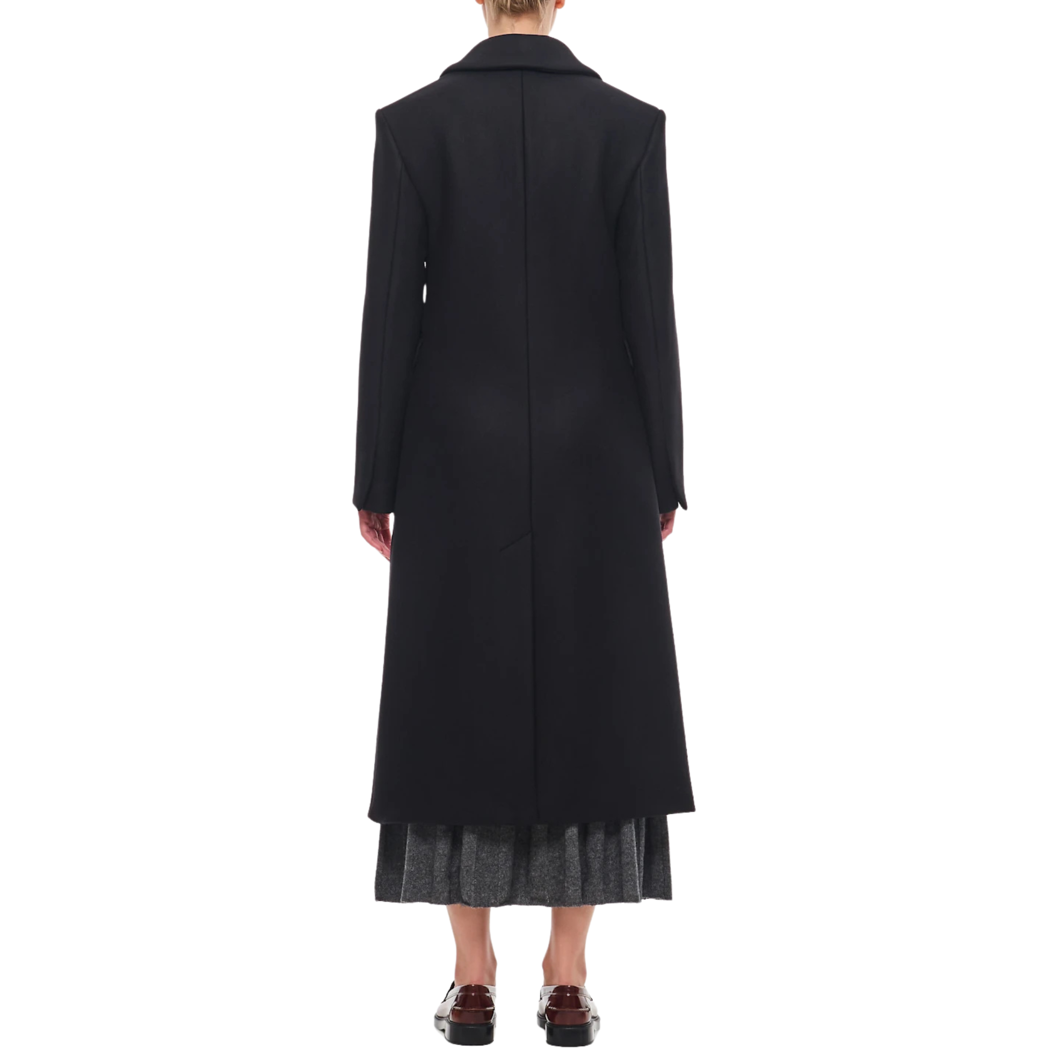 Celebrity-inspired Allison Janney black wool coat outfit from The Diplomat