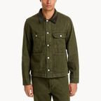 Beyond the Gates 2025 Izaiah Hawthorne green denim jacket outfit