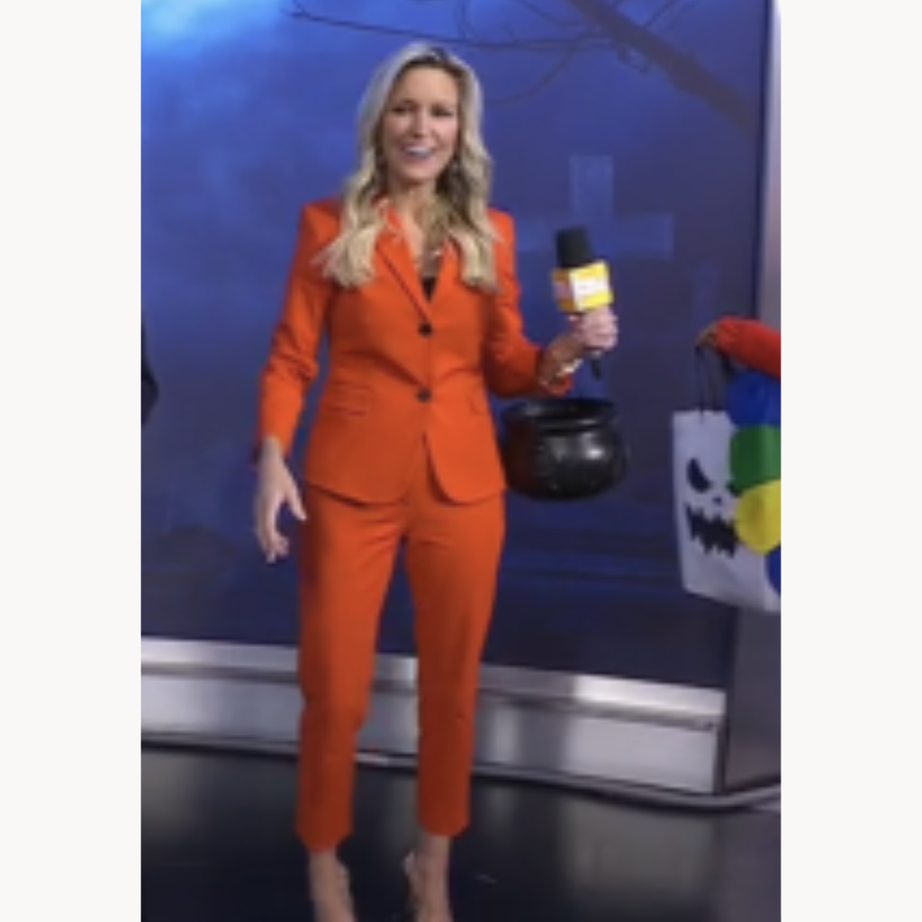 Ainsley Earhardt wearing fire opal shrunken orange suit on Fox and Friends October 2025