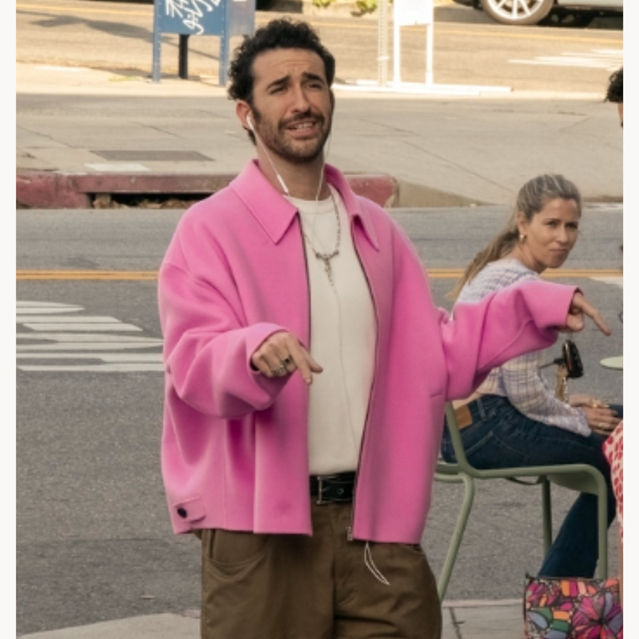 Jordan Firstman wearing oversized pink wool zipper jacket in I Love La Season 1