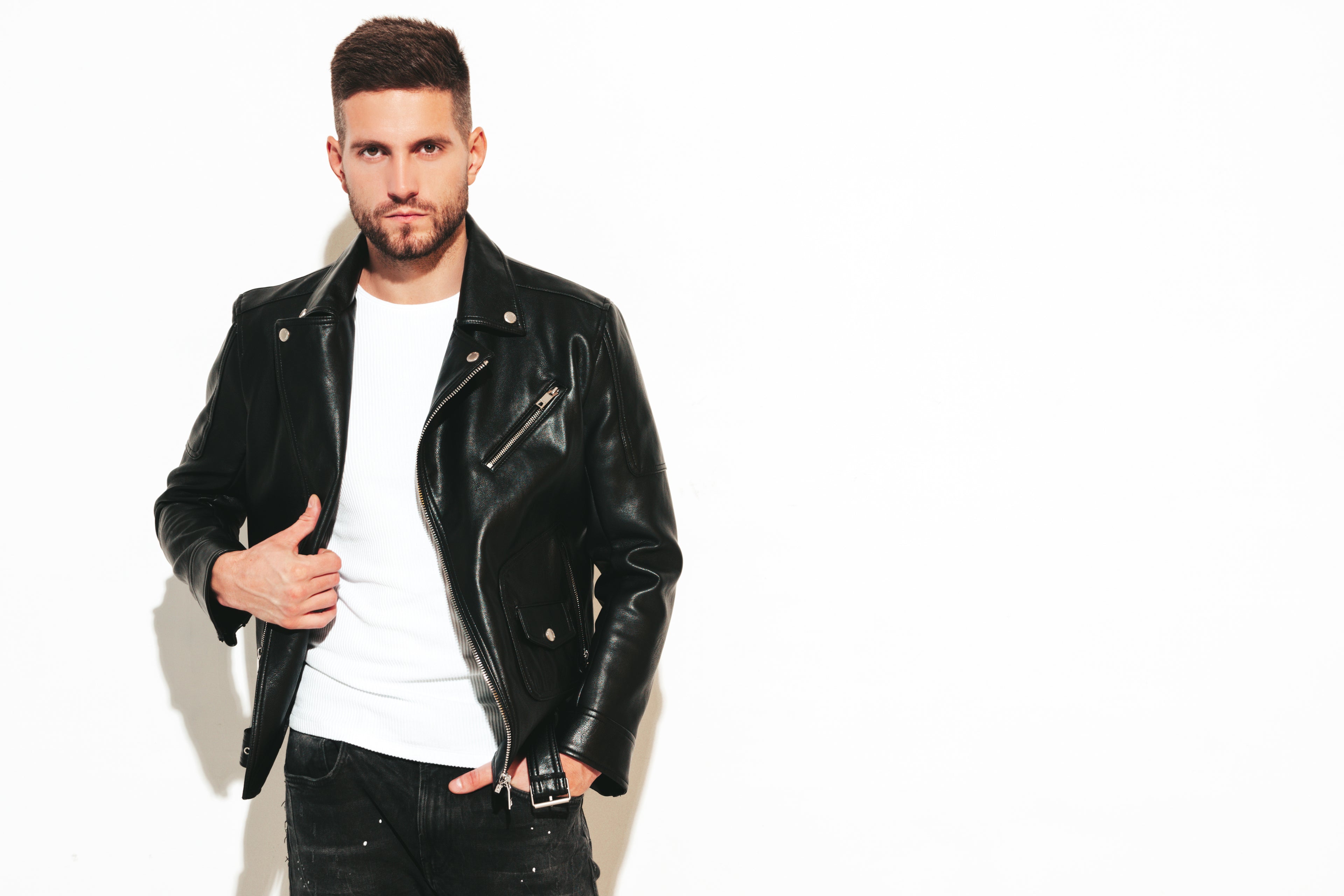 Men's black leather jacket banner showcasing premium outerwear from Outer Mode