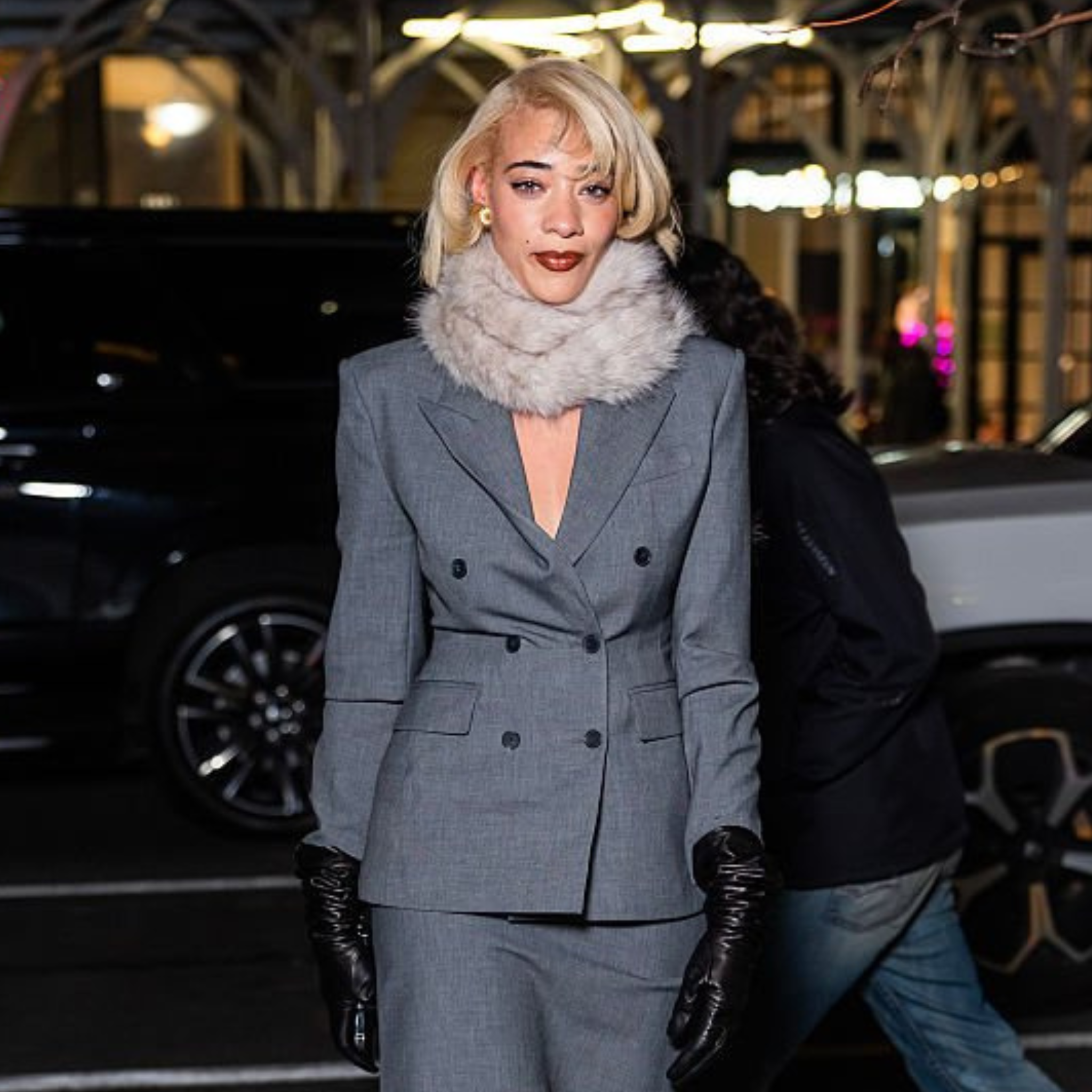 Reign Judge wearing grey double-breasted peak lapel blazer at Aritzia Flatiron Store Opening NYC 2025
