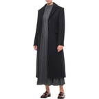 Celebrity-inspired Allison Janney black wool coat outfit from The Diplomat