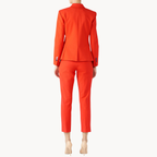 Ainsley Earhardt stylish orange shrunken blazer and pants set from Fox and Friends