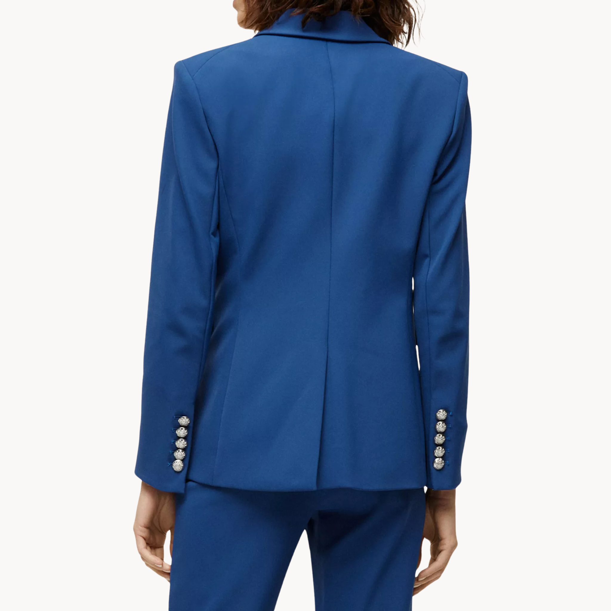 Women’s blue double-breasted blazer with silver military button accents